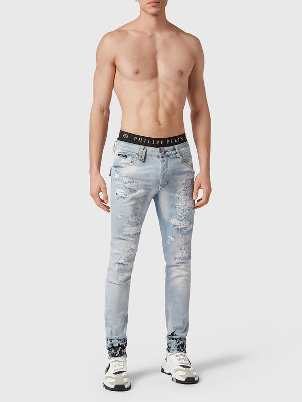 Blue slim jeans with contrasting print - 4