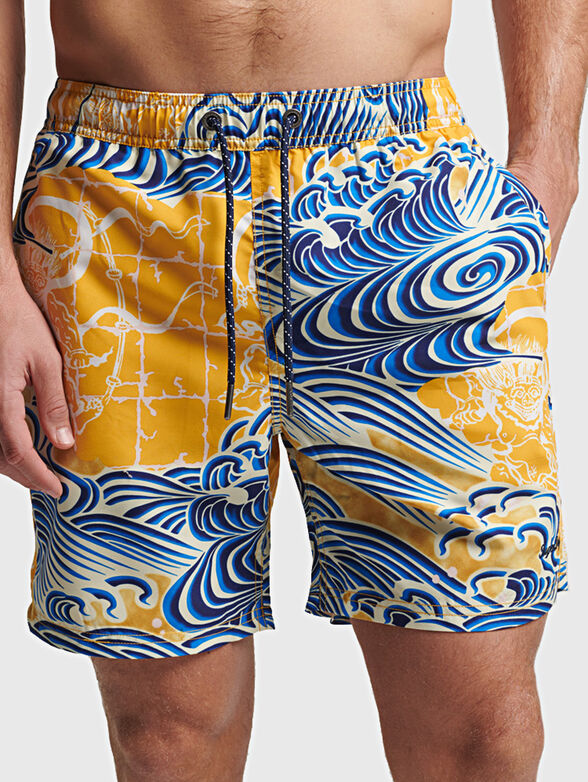 VINTAGE HAWAIIAN beach shorts with floral print - 1