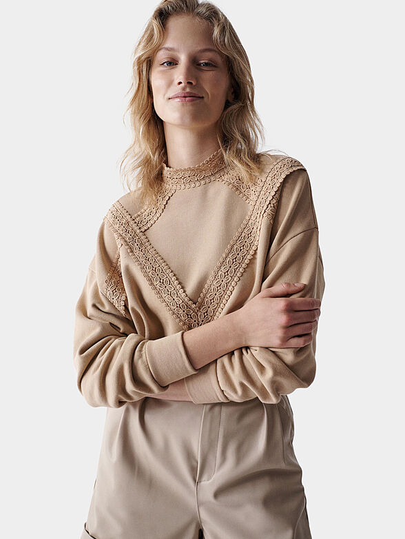 Beige sweater with lace accents - 1