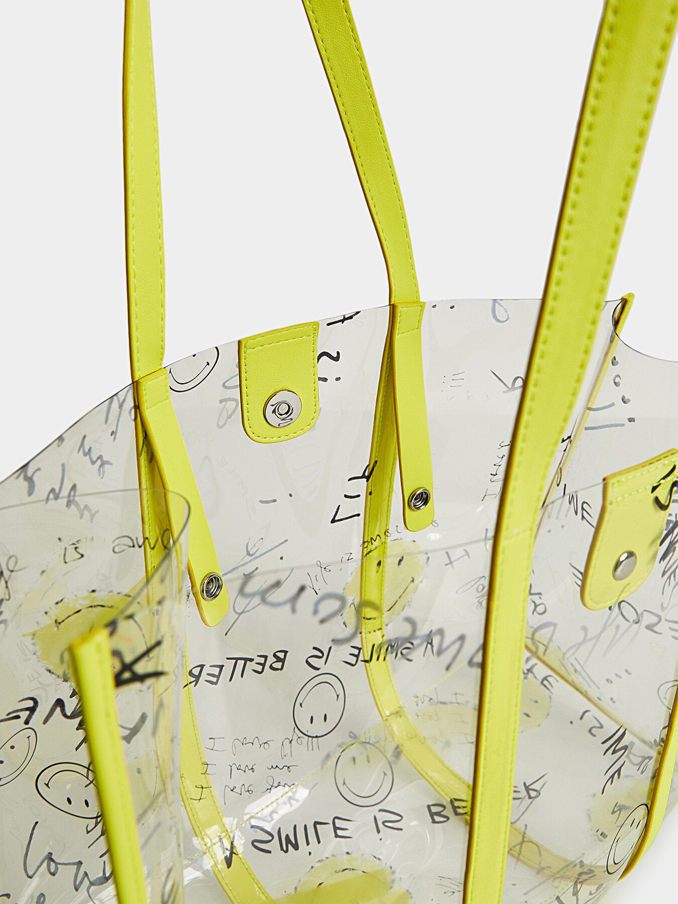 Transparent bag with green accents brand DESIGUAL