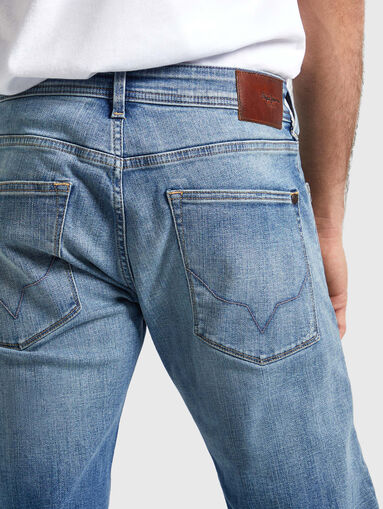 Light blue jeans with accent rips  - 3