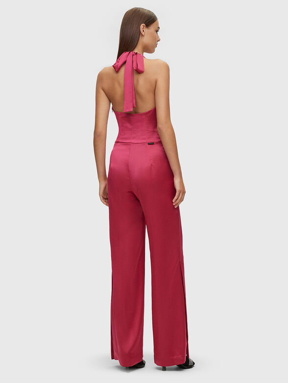 Jumpsuit with halter neckline and satin texture - 1