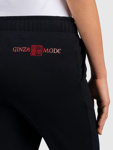 Sports pants with inscriptions - 4