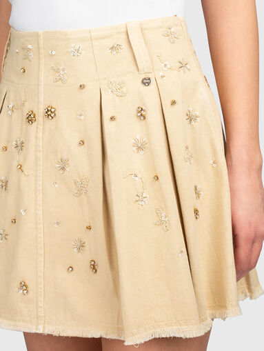 Mini pleated skirt with crystal appliques - 4