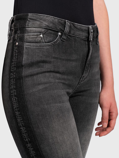 Skinny jeans with branded straps - 3