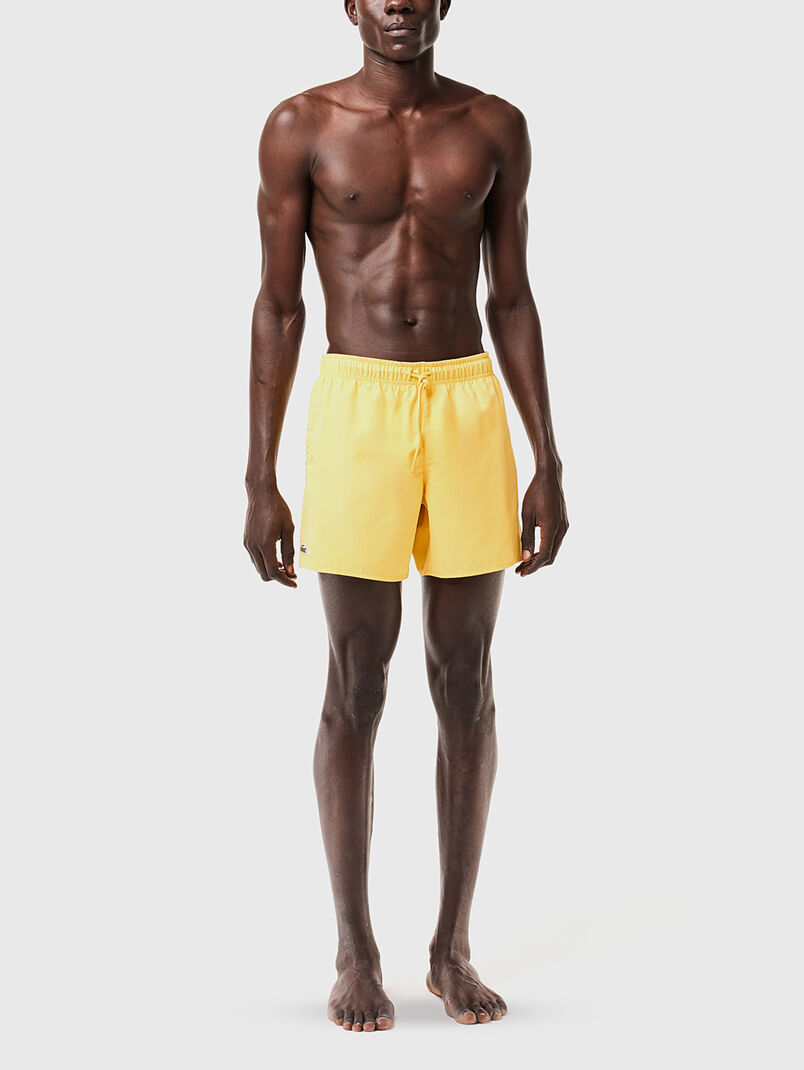 Yellow shorts with logo detail - 3