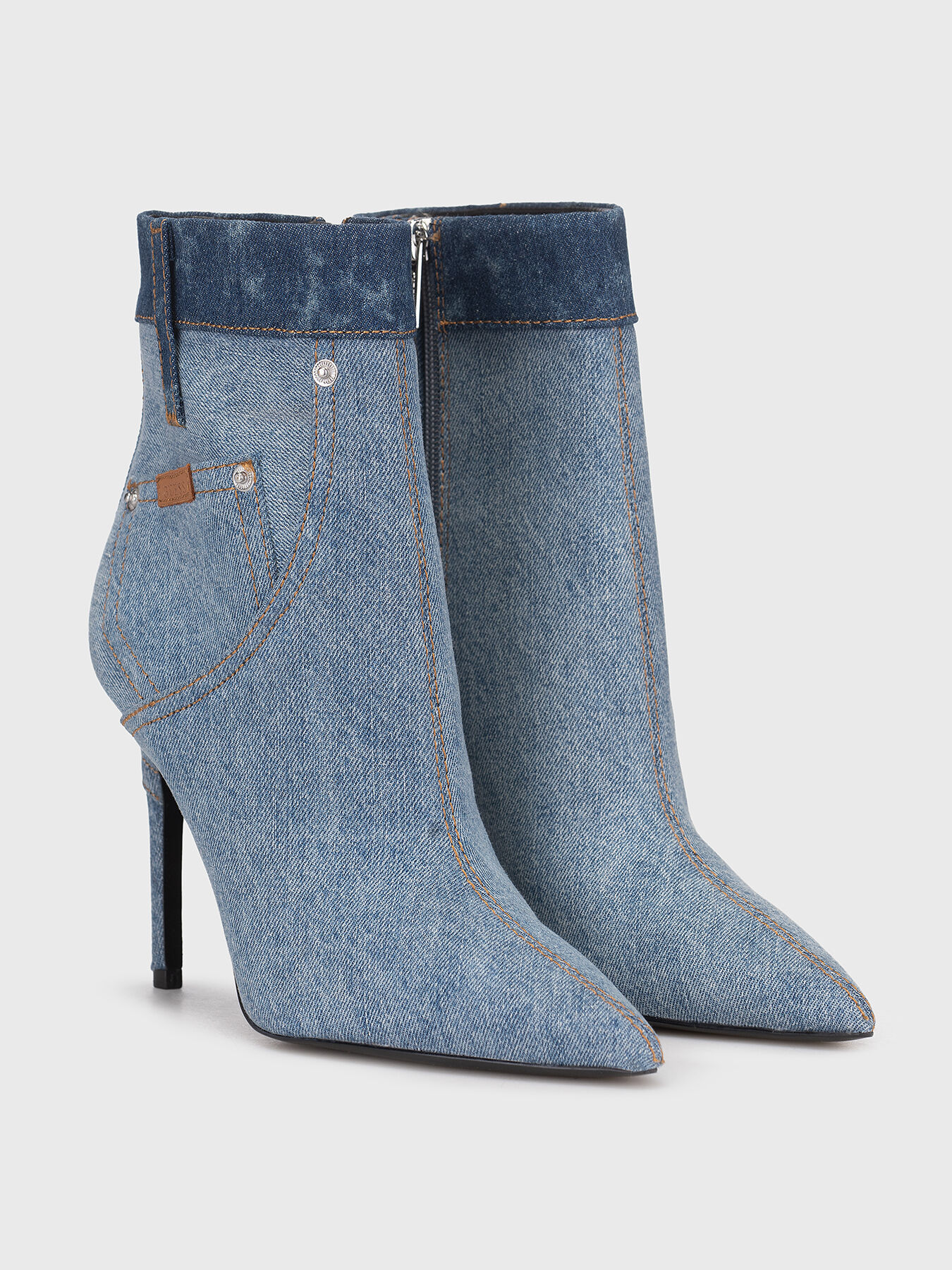 AVON boots with denim texture brand GUESS Globalbrandsstore en
