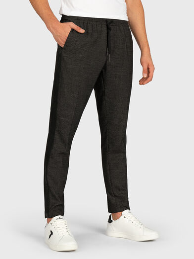 Trousers with faux leather sidebands - 1