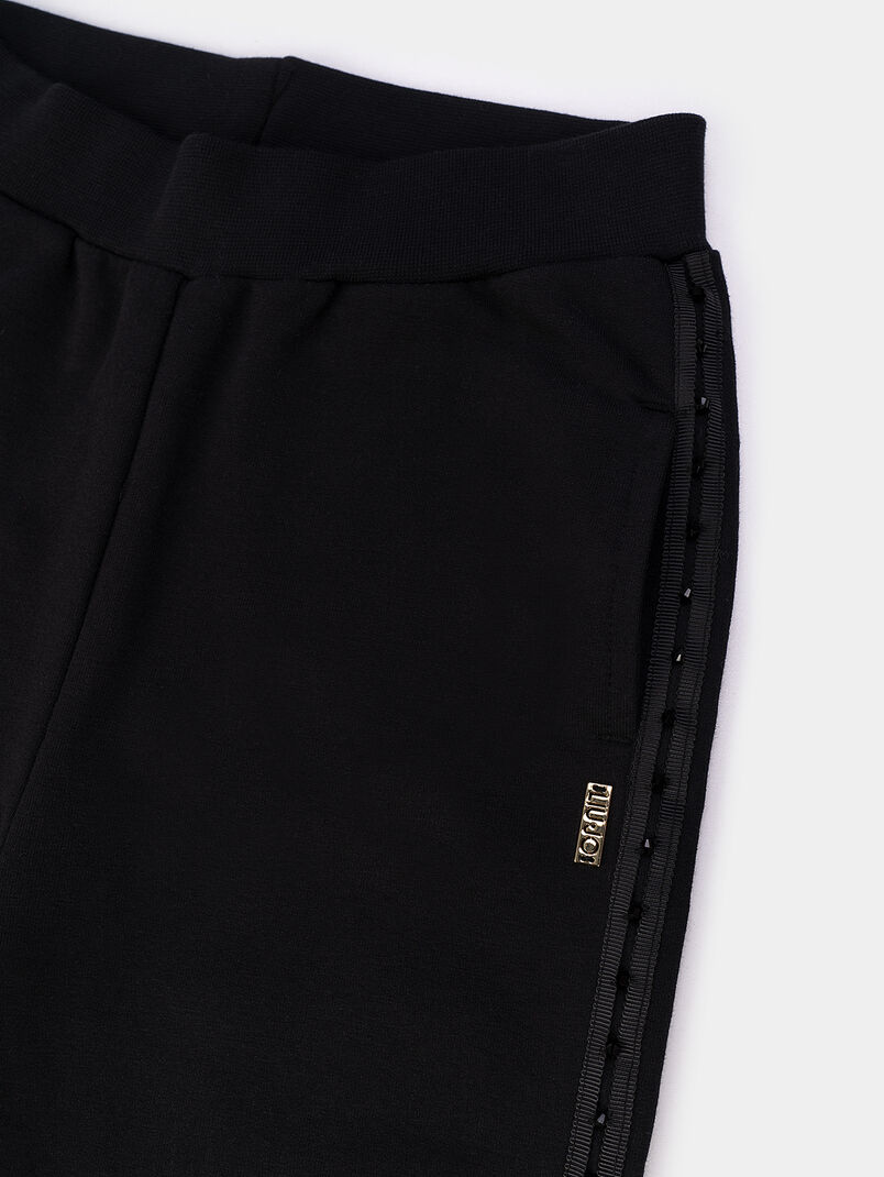 Sports trousers with logo detail and shiny accents - 3