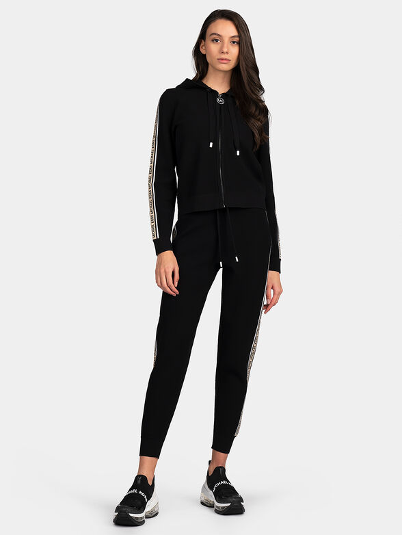 Track pants with branded stripes - 4