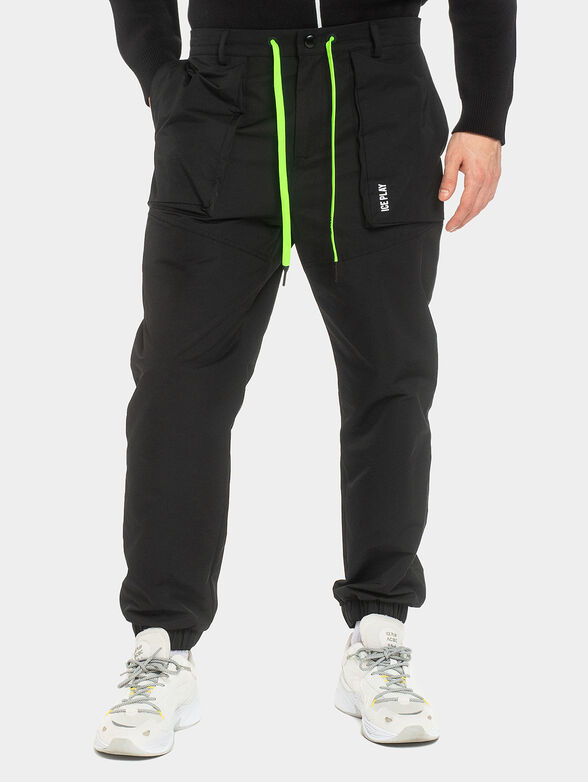 Sports pants with laces in neon color - 1