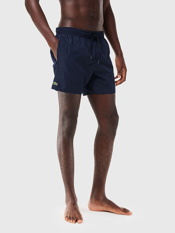 Yellow shorts with logo detail - 3