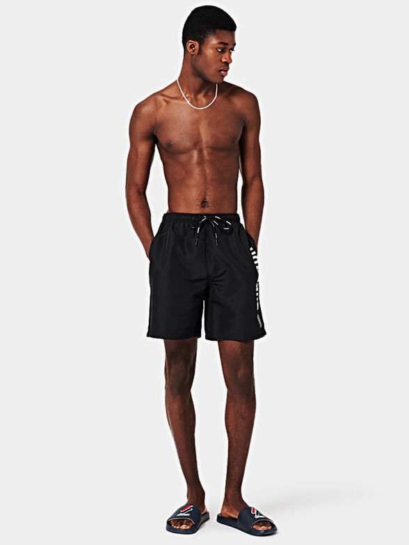 Beach shorts in black color - 1