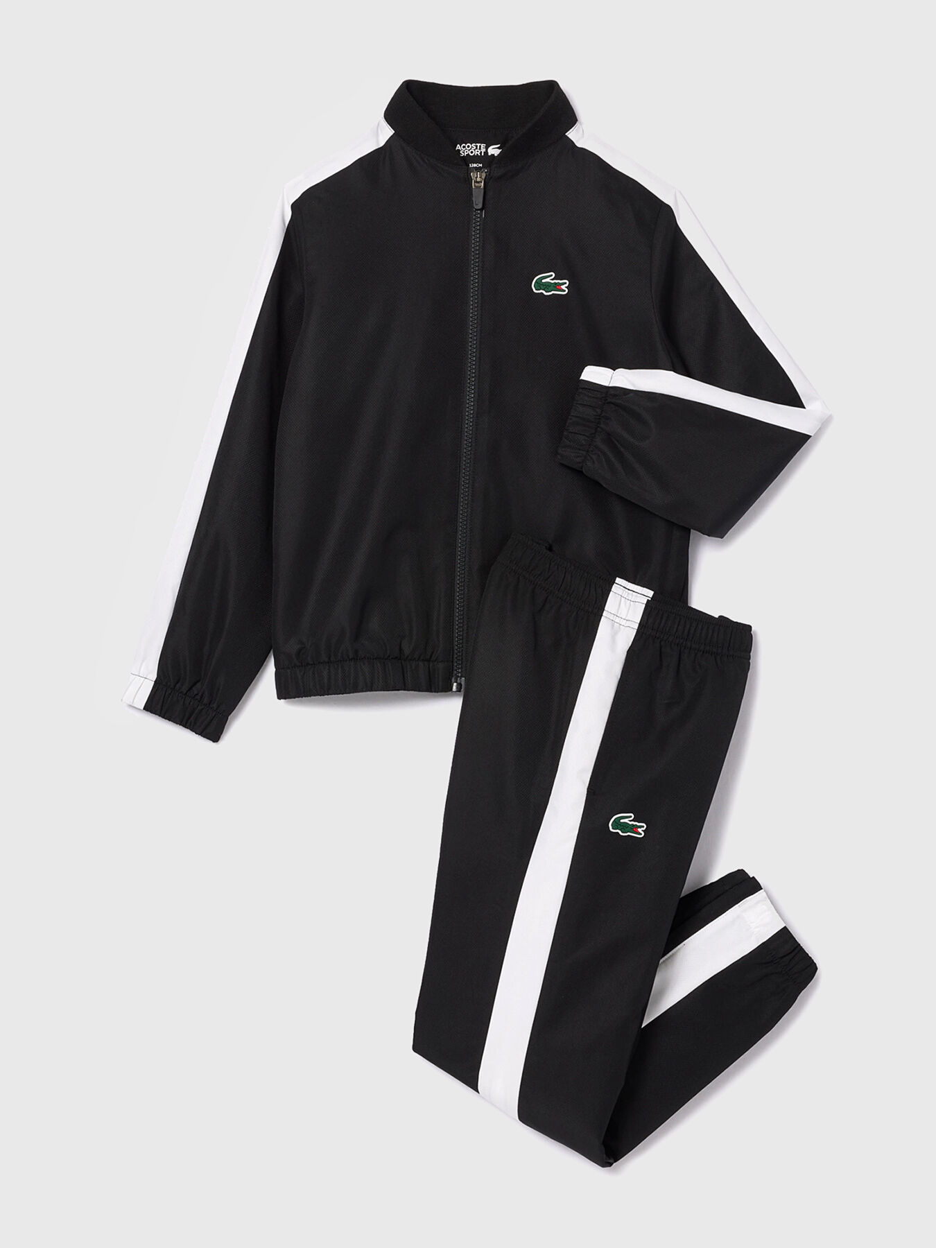 Black sports tracksuit brand LACOSTE — Globalbrandsstore.com/en