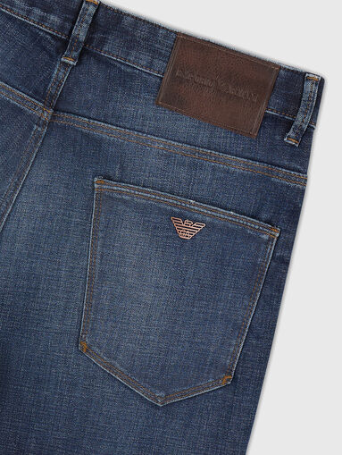 Jeans with washed effect and accent rips - 2