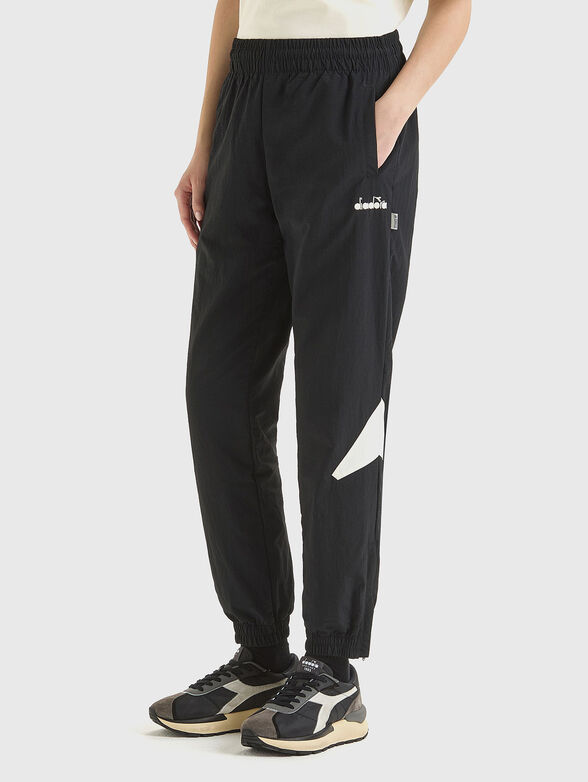 LEGACY unisex black sports trousers - 1