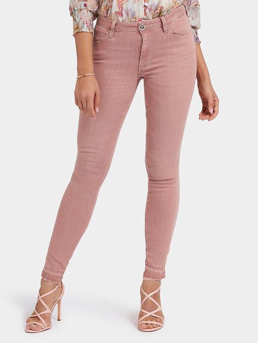 Pink jeans with triangular logo patch