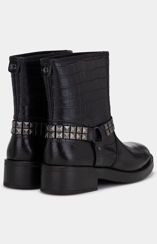 Black boots with animal texture brand GUESS —