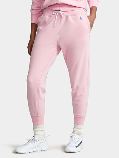 Sports pants in pale pink color - 1