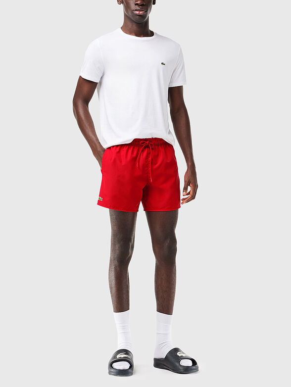 Yellow shorts with logo detail - 4