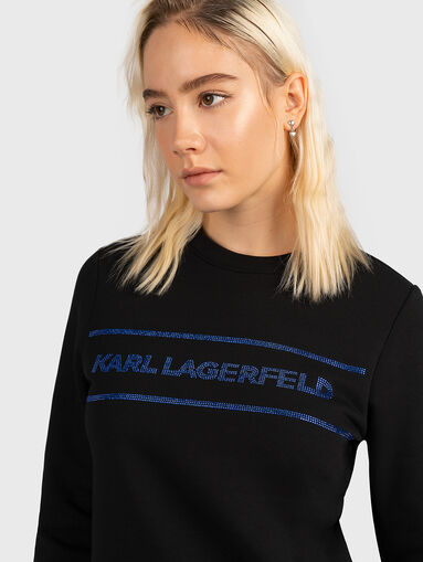Sweatshirt with logo accent from applied rhinestones - 4