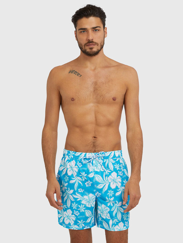 IBISCUS blue swimtrunks with floral print - 1