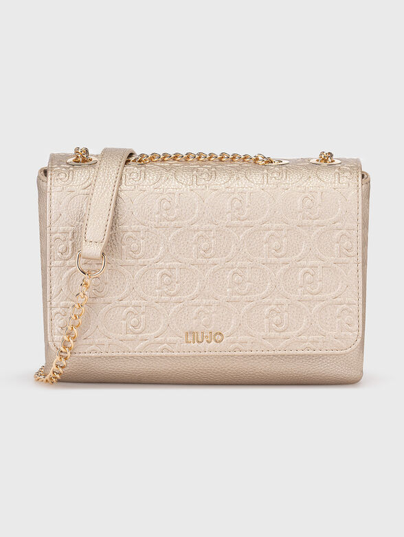 Gold bag with monogram logo texture - 1