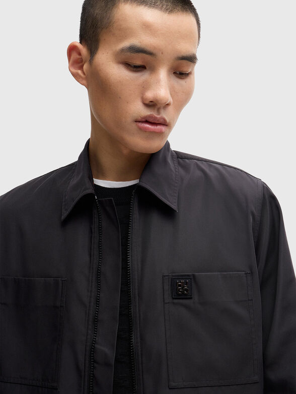 EVALOM black jacket with logo detail - 4