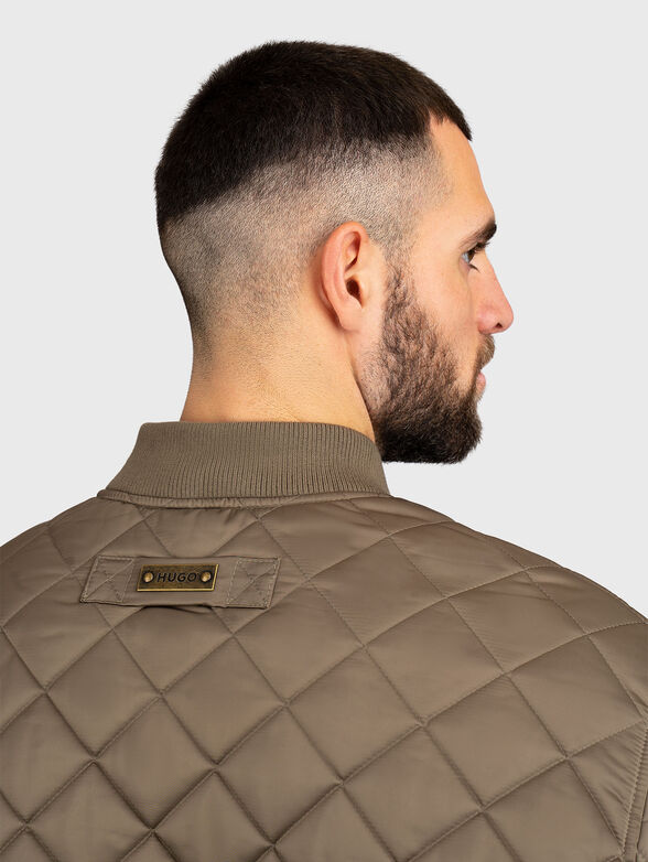 Quilted jacket with side pockets - 4