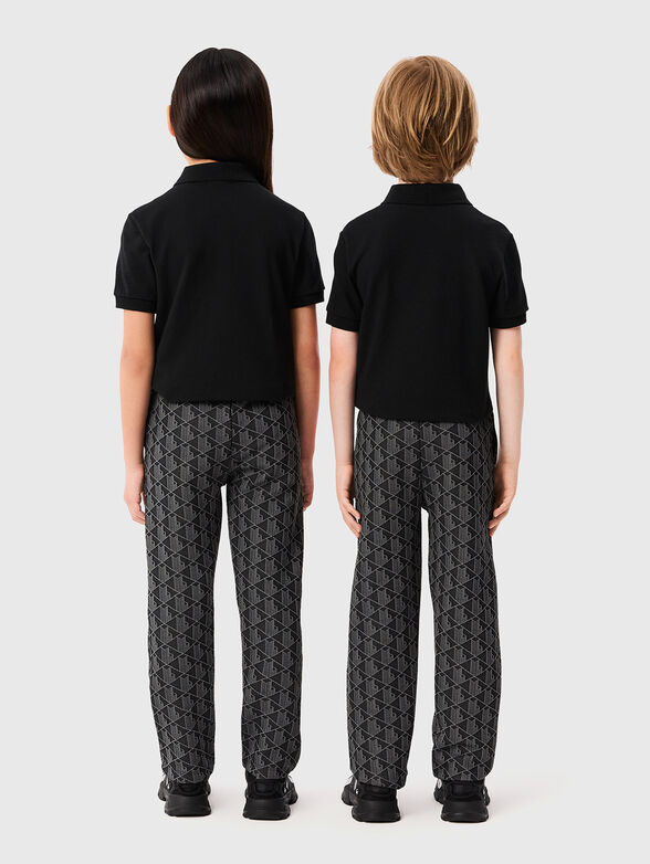 Black sports trousers with geometric pattern - 2