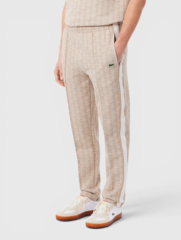 Brown sports trouser with monogram print - 1