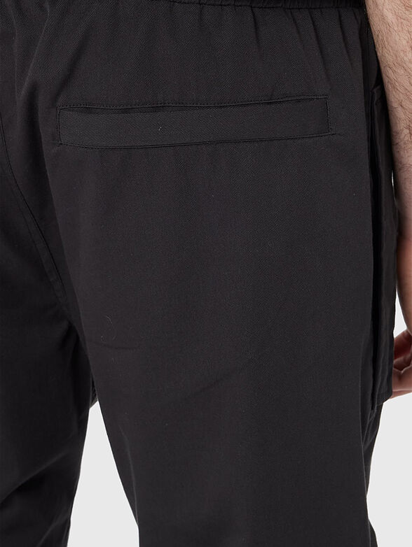 Black pants with accent pockets - 5