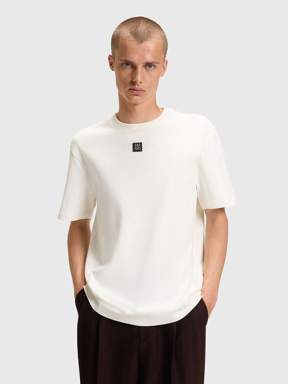 Cotton T-shirt with oval neckline in black - 1