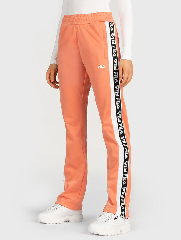Track pants with branded stripes - 1