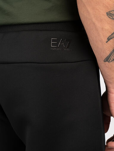 Logo-print sweatpants in black  - 5