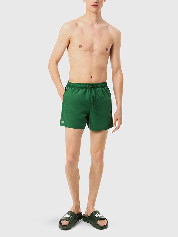 Yellow shorts with logo detail - 3