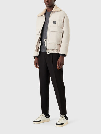 Slim trousers with cuffs and logo detail - 5