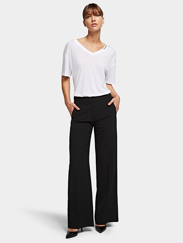 Trousers with back slit hem - 1