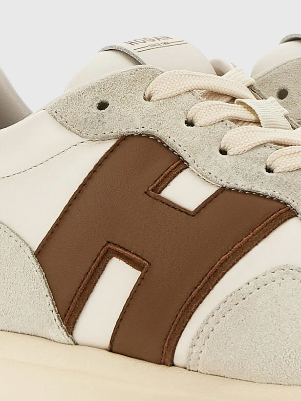 Leather sneakers with a contrasting logo - 5
