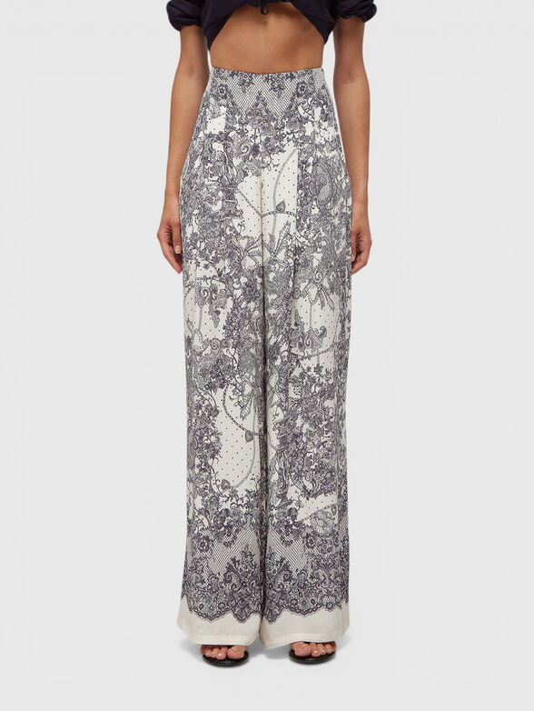 Pants with lace print - 1