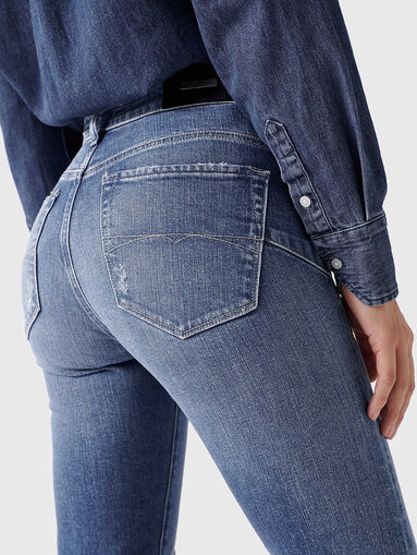 Blue jeans with rips  - 3