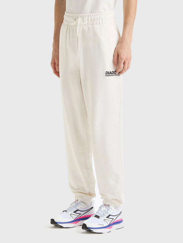 LEGACY unisex sports trousers in white - 1