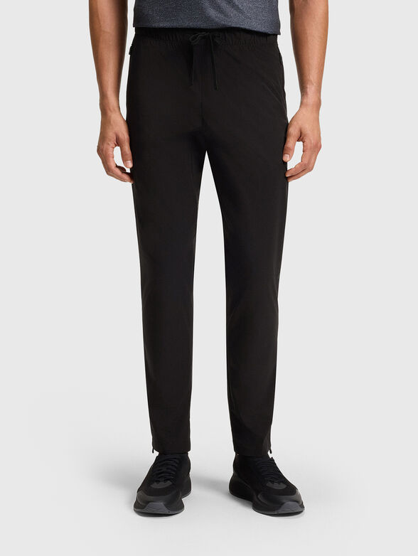 Sport trousers with an accent zip and logo - 1