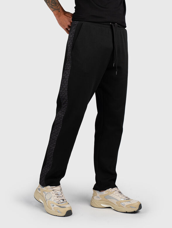 Cotton sports trousers with logo trim - 1