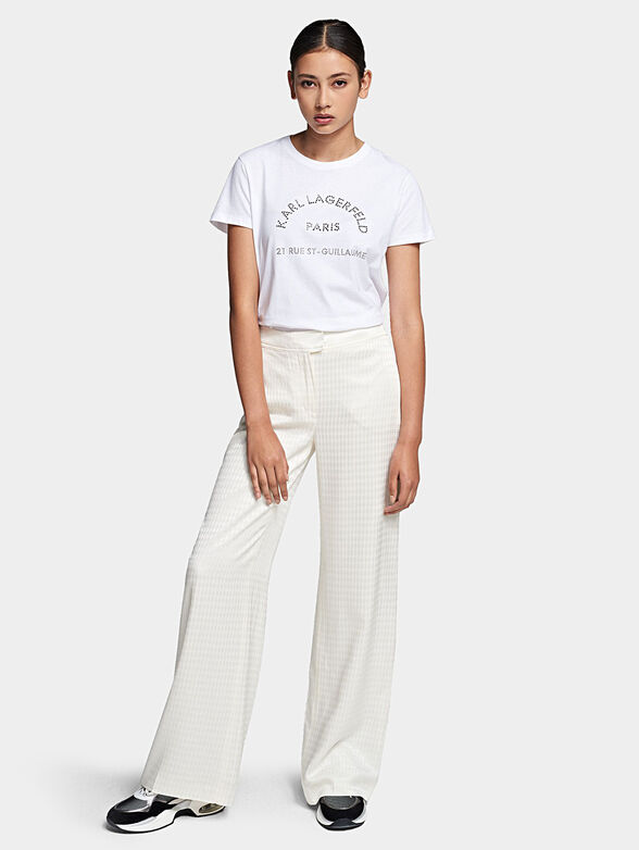 Black pants with logo print - 1