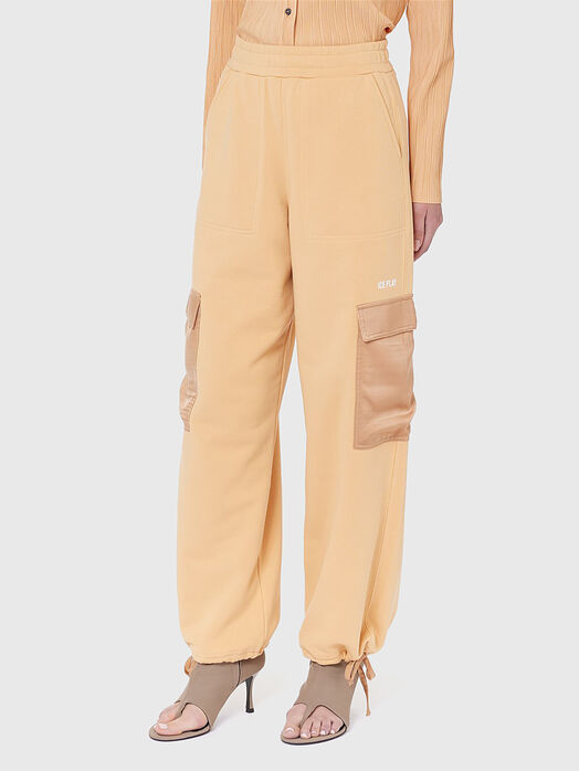 Pants with satin pockets