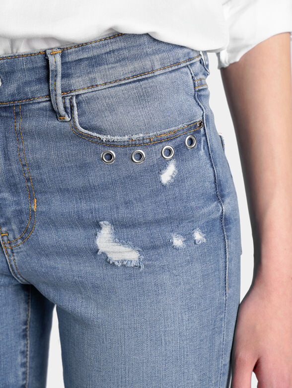 Jeans with abrasions - 3