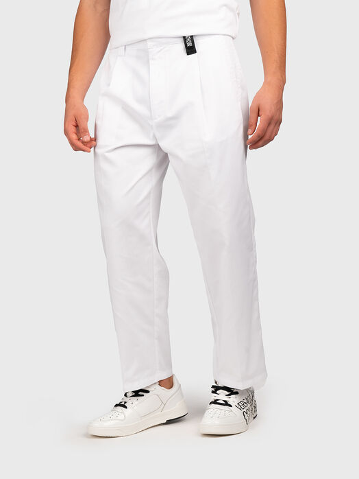 White pants with contrast logo detail