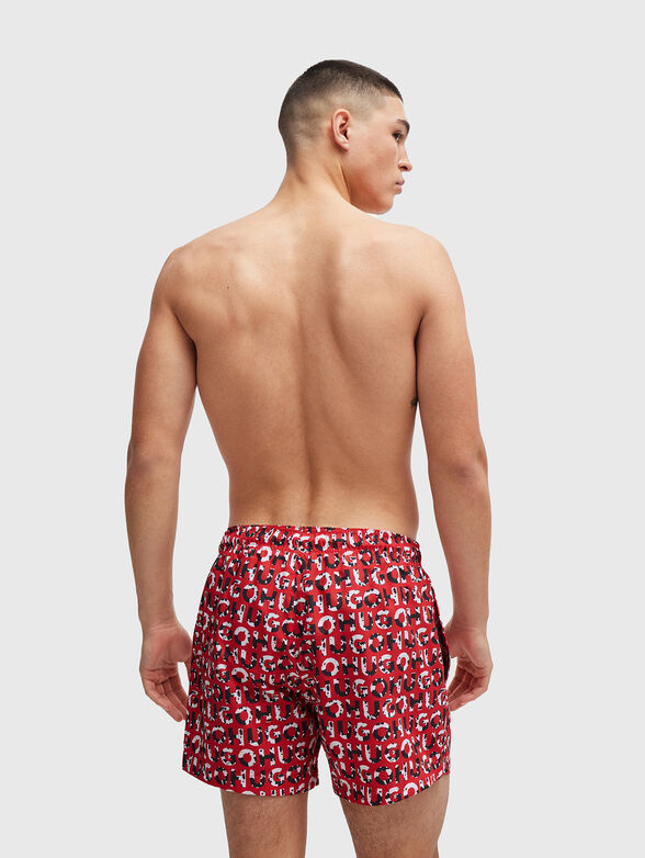 TORTUGA beach shorts with a monogram print - 2