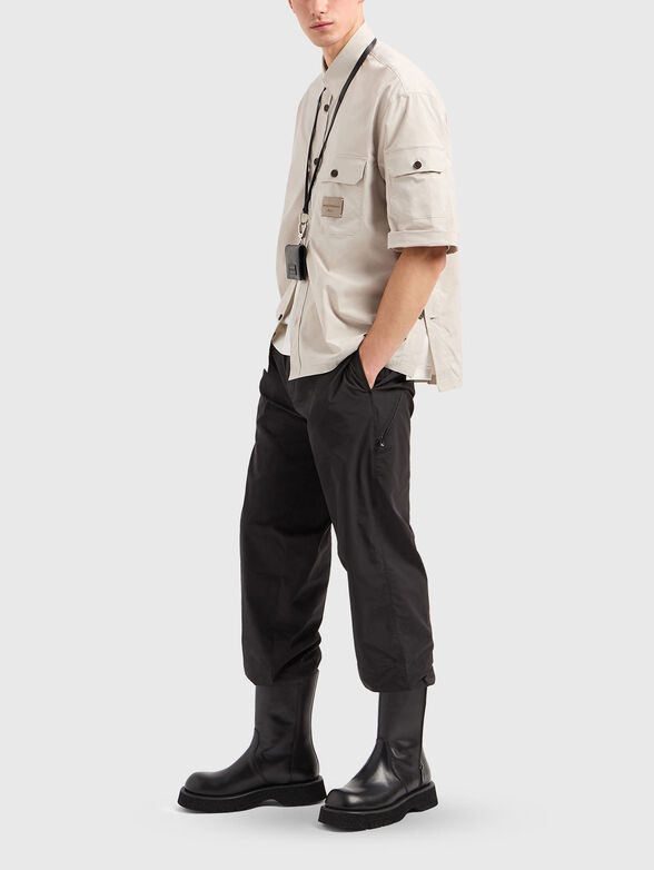 Trousers with zip pocket - 4